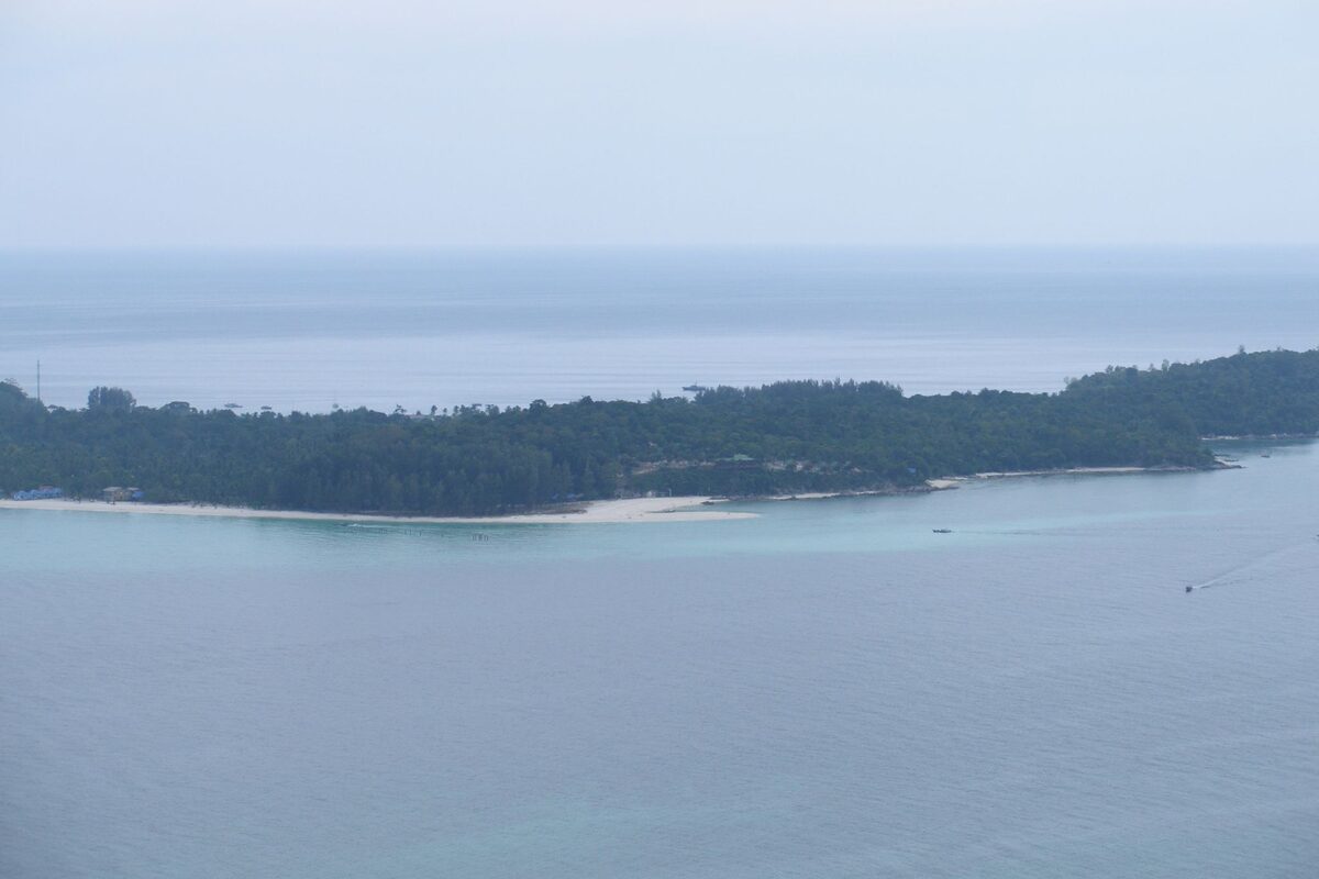 Koh Lipe seen from the top of Koh Adang: a white sandspit, forest and boats on the water
